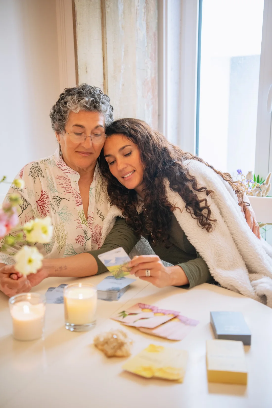 A mother and daughter sharing a Death Bed Questions card